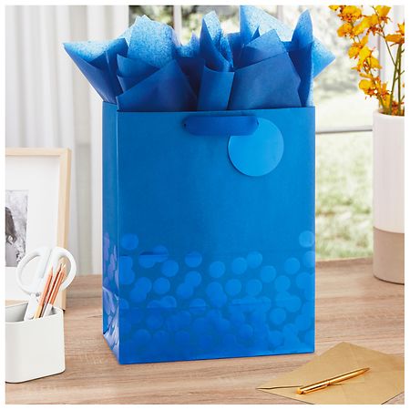 Blue Gift Bag Stock Photo - Download Image Now - Goodie Bag, Tissue Paper,  Gift - iStock